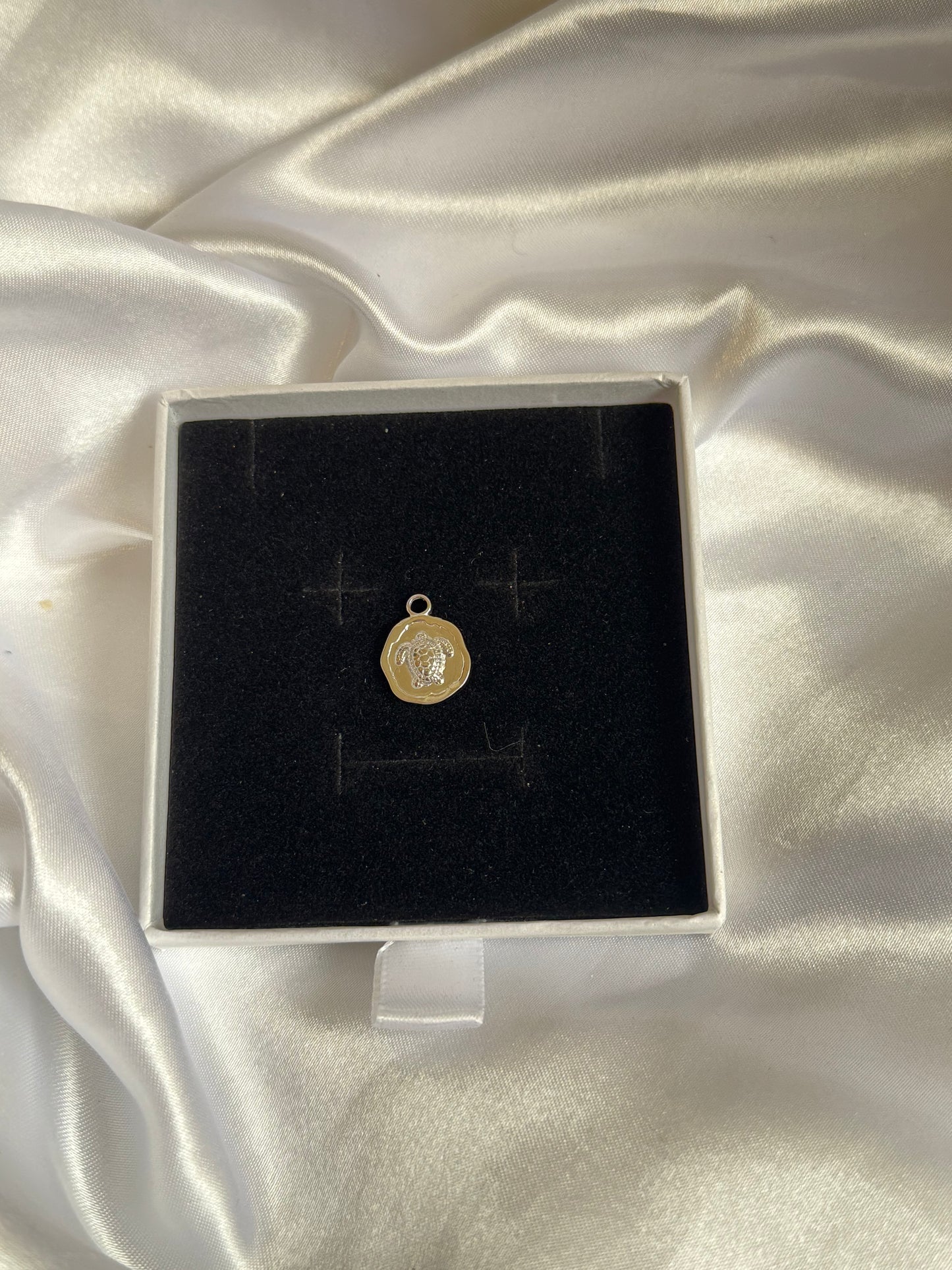 Silver turtle charm