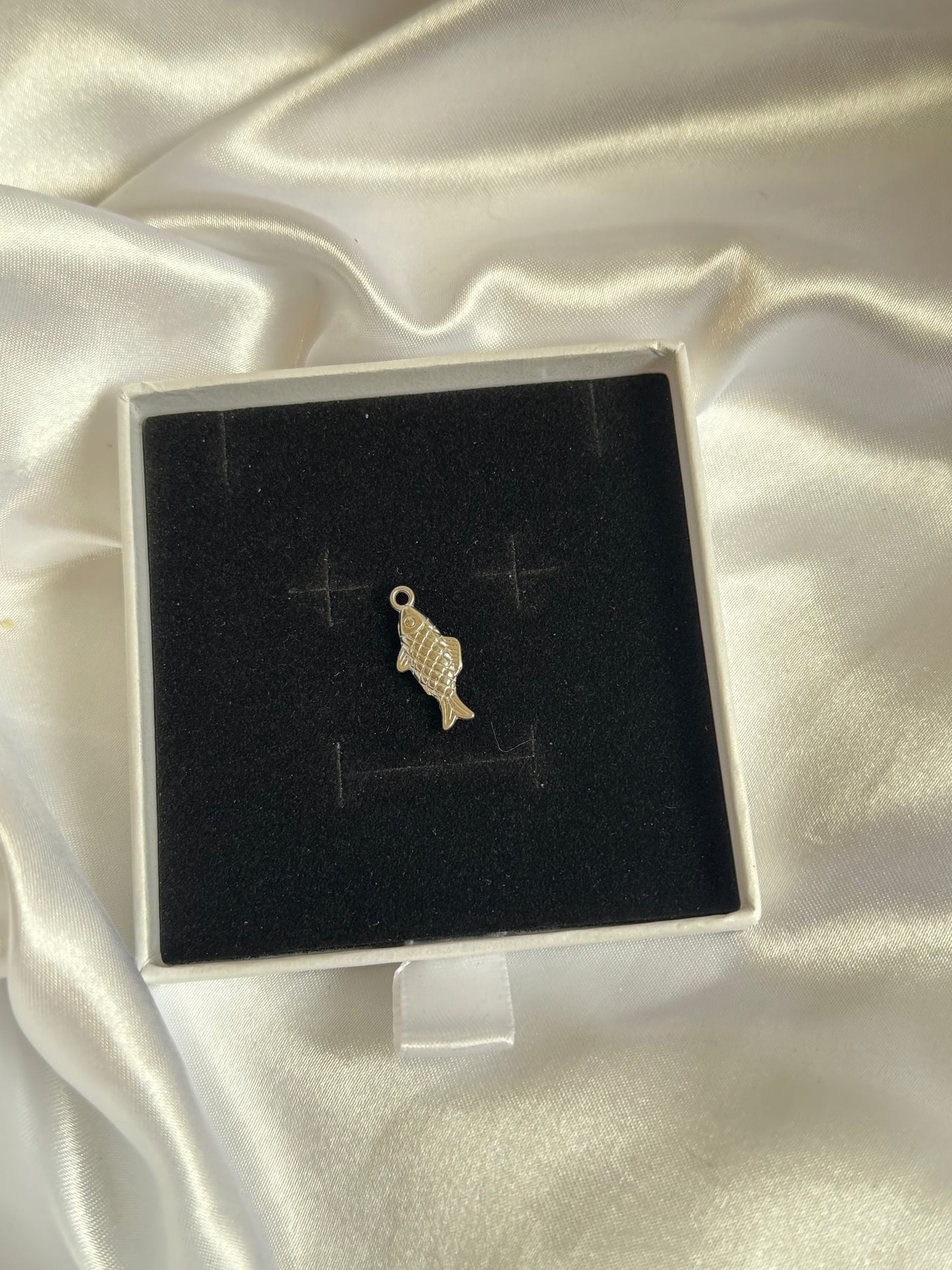 Silver fish charm