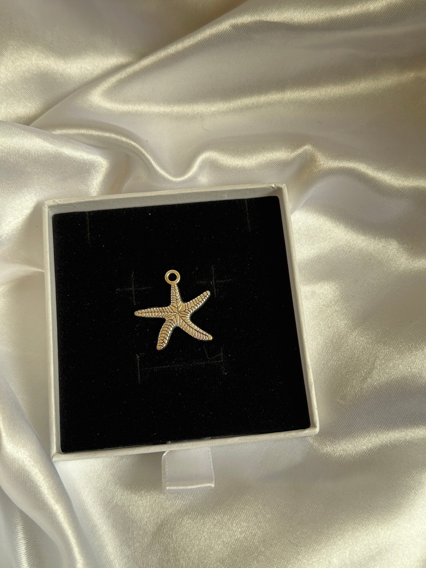 Silver starfish charm