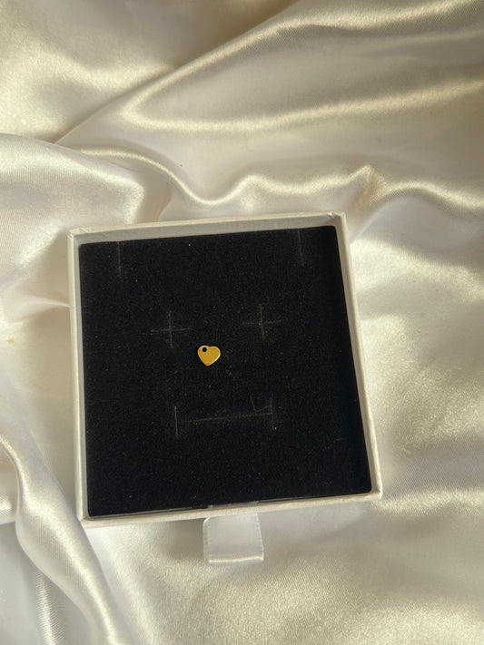 Gold heart charm