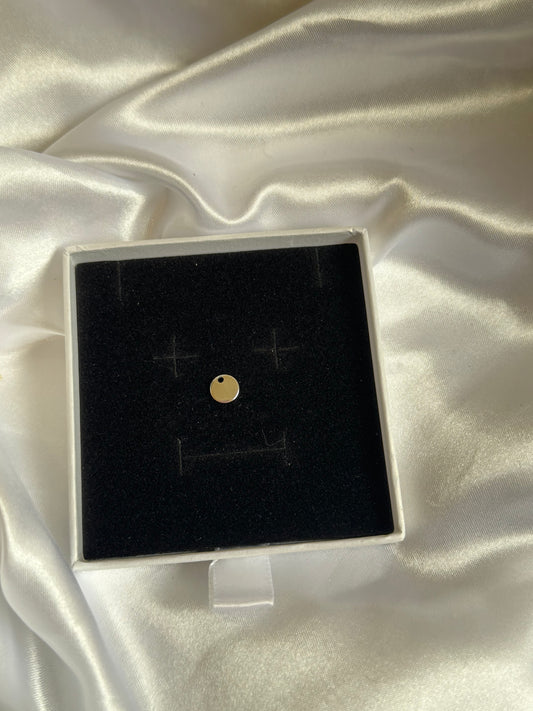 Silver cirlce charm